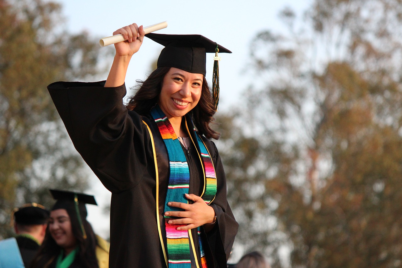 Woman graduating with an Associate's degree