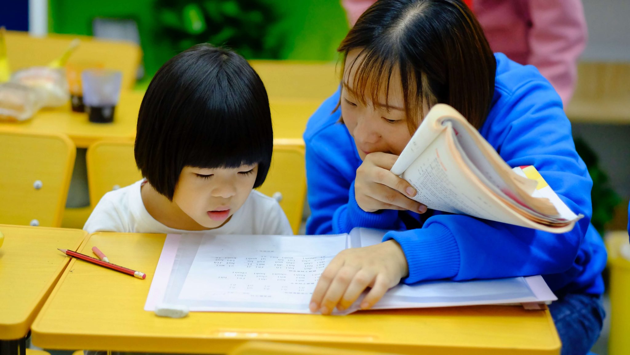 preschool teacher and student