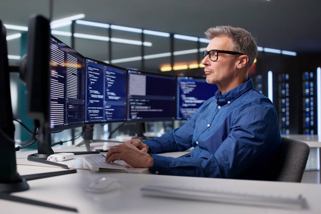 Programmer Developing Cybersecurity Software For Businesses