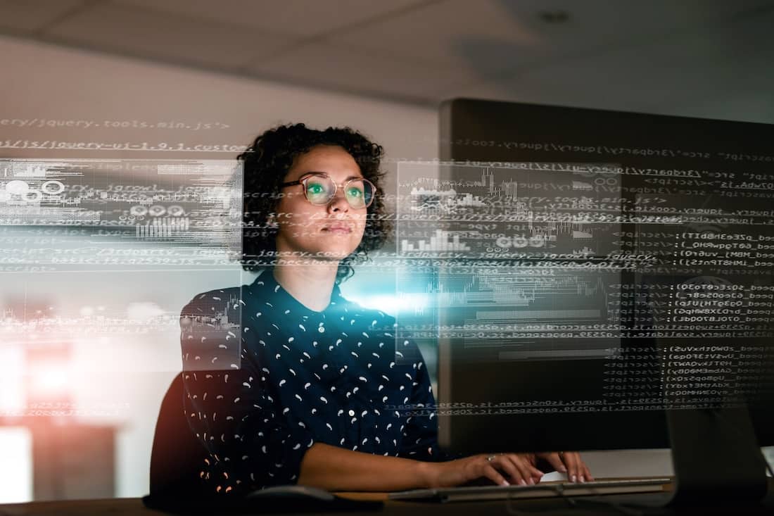 Female Programmer Working with Advanced Digital Interface and Code